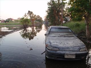 Abandoned flood damaged car